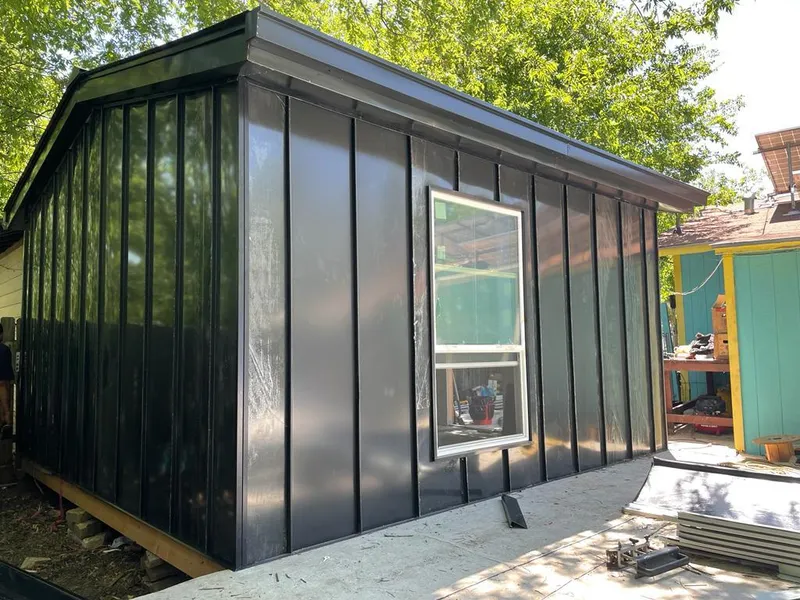 Black standing seam metal wall panels for Metal Roof Installation in Wolfforth